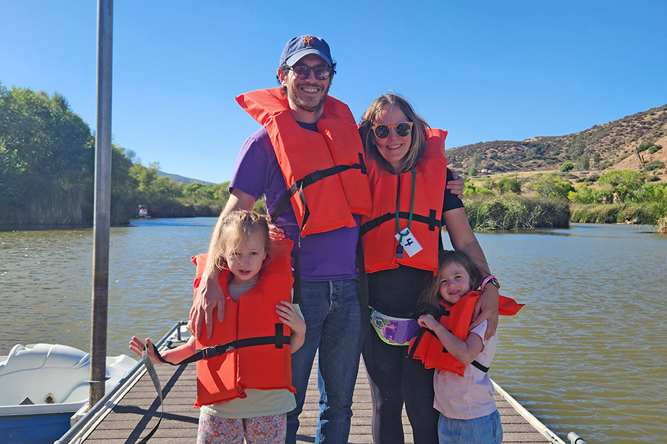Family at camp enjoying boating