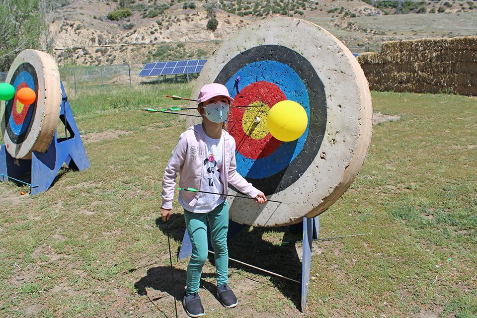 Chloe participating in Archery!