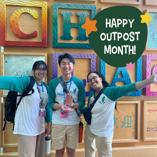 Three Outpost members posing for a photo at CHLA with text that reads, "Happy Outpost Month!"