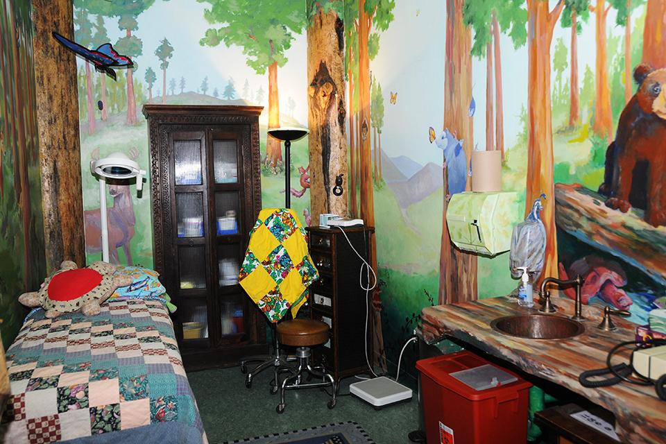 The Treeage Room contains  a forest of animals and birds.