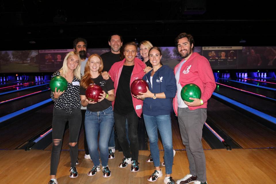 Group of volunteers bowling to raise funds for The Painted Turtle