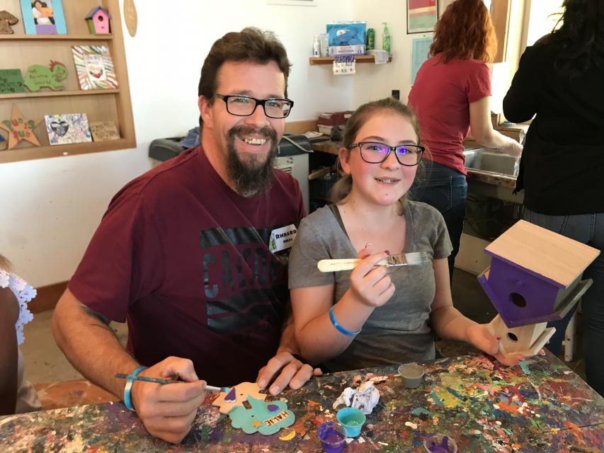 Dad and daughter enjoying a Family Weekend.